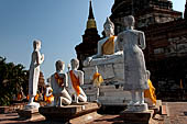 Ayutthaya, Thailand. Wat Yai Chai Mongkhon, statues group of Buddha with disciples. 